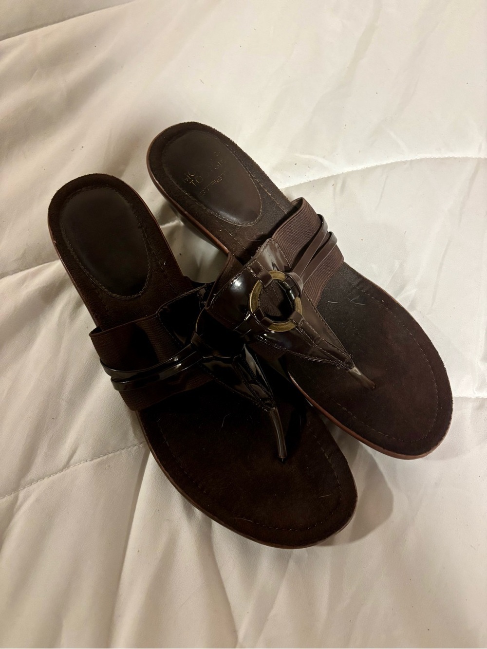 Woman’s size 8 brown sandals with small heel